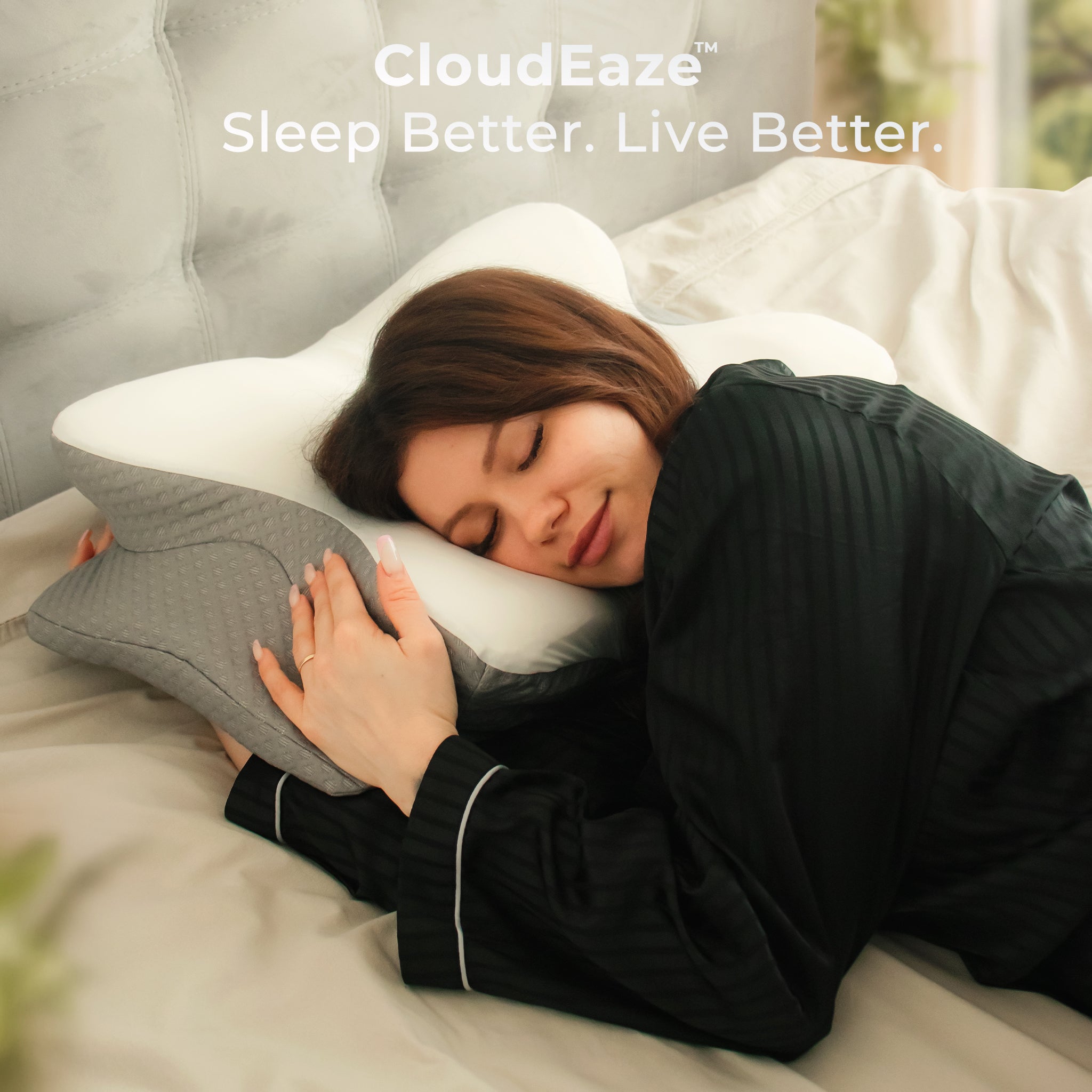 Person lying in bed using a CloudEaze pillow with the brand name displayed.