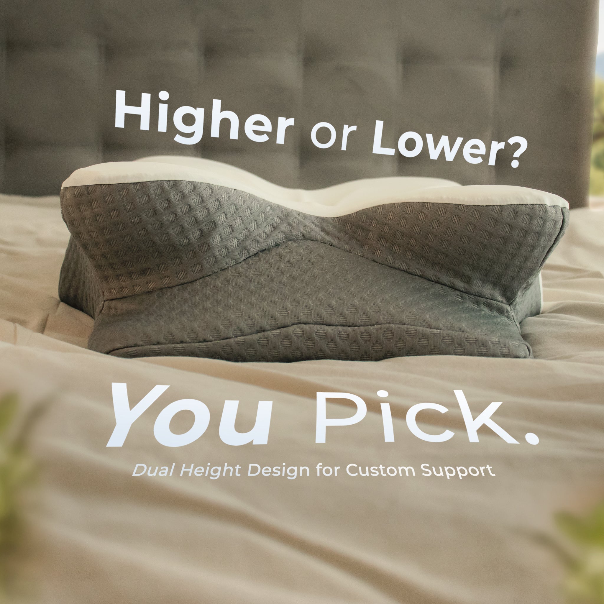 Gray dual-height pillow on a bed with text 'Higher or Lower? You Pick.'